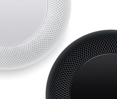 Two Apple HomePod Speakers in Space Grey and White