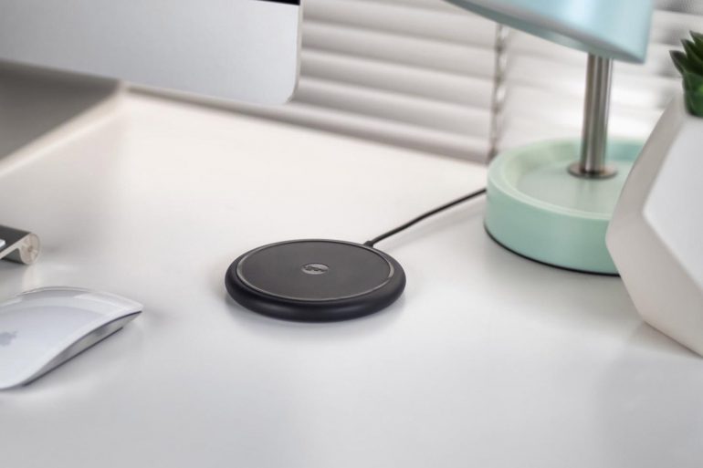 mophie wireless charging base on desk for iPhone
