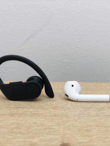 Apple AirPods and Powerbeats Pro side by side