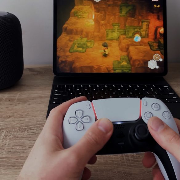 Playstation 5 Controller playing game on iPad Pro